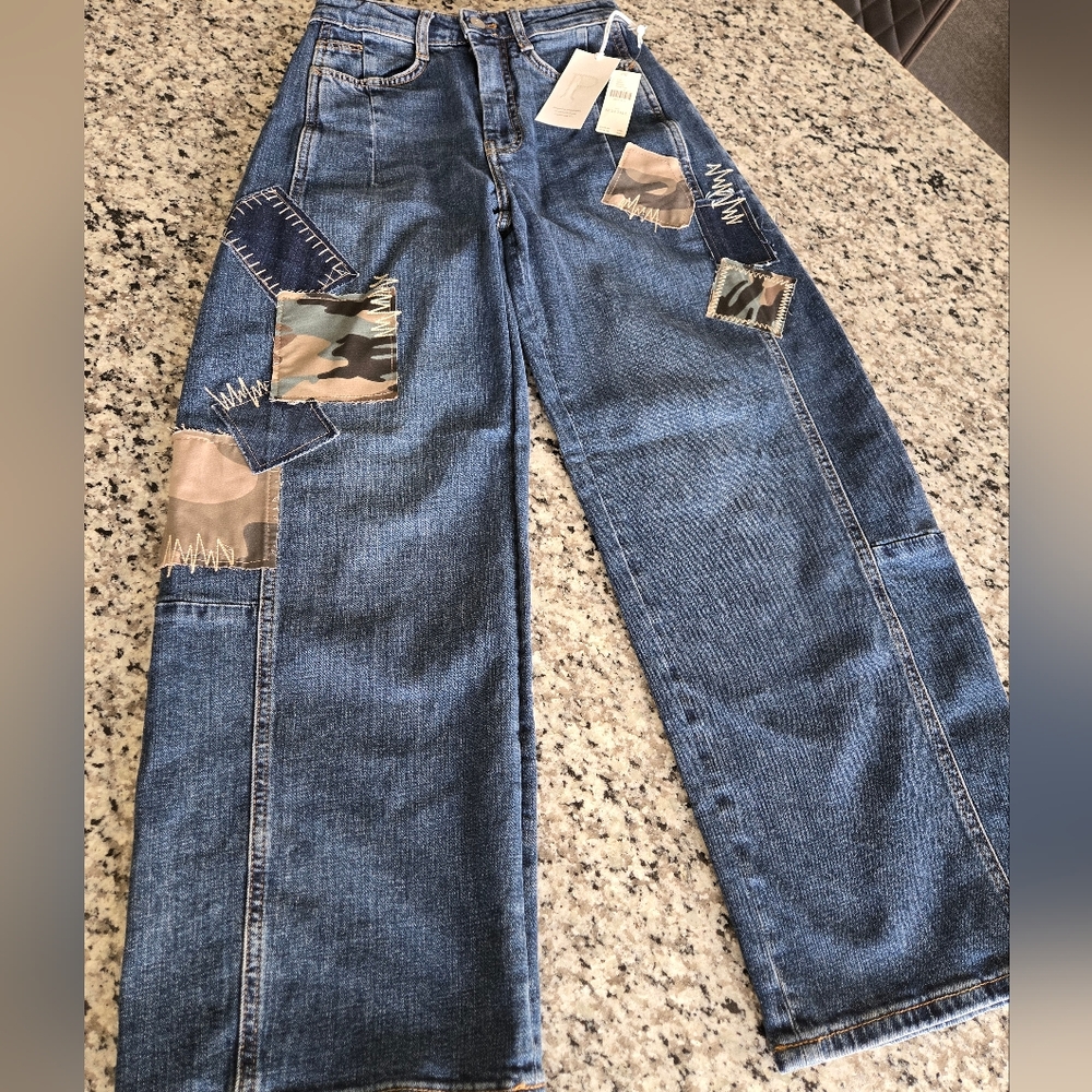 Anthroplogie Pilcro barrel jean with camo patches. 24T